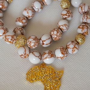 2 beaded bracelet with Africa Bling charms